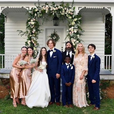 Jules Augustus Robertson and his family took a family picture on his sister's wedding day